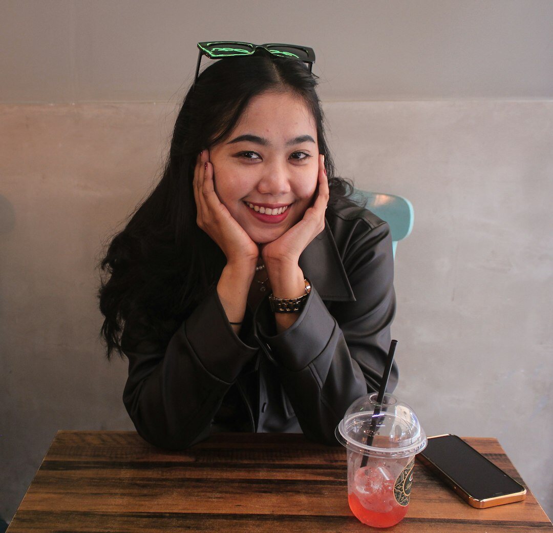 Professional woman in business attire smiling
